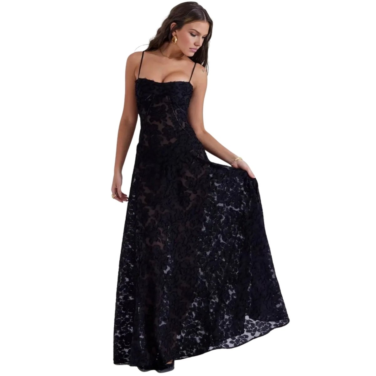 Woman wearing a black Kouvr floral lace dress on a white background