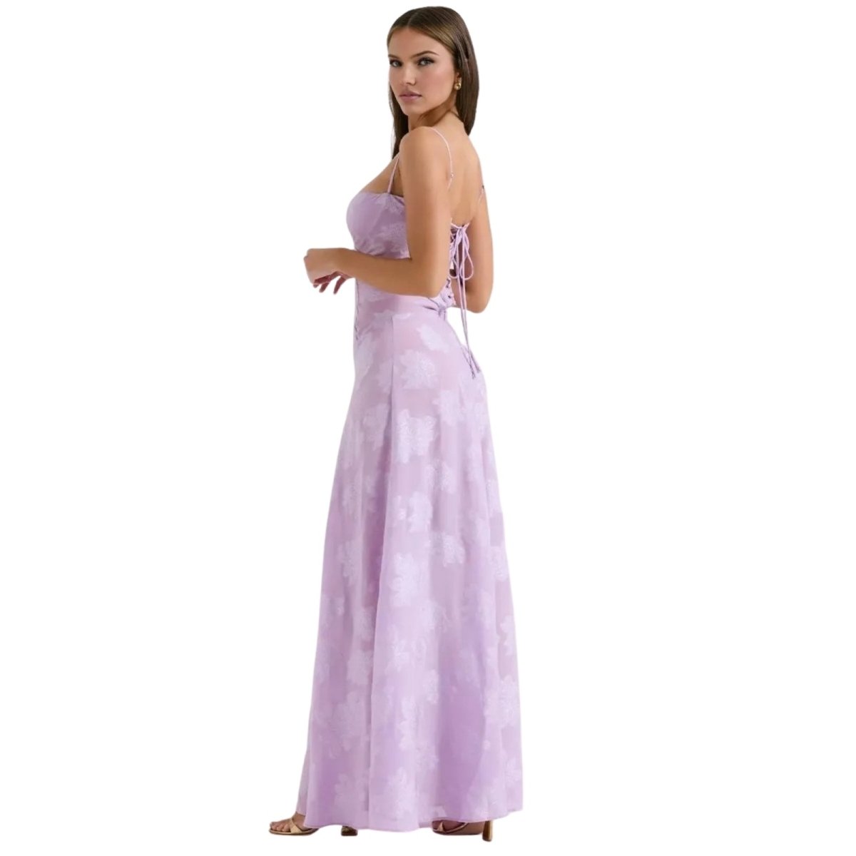 Woman wearing a strapless purple Kouvr dress on a white background