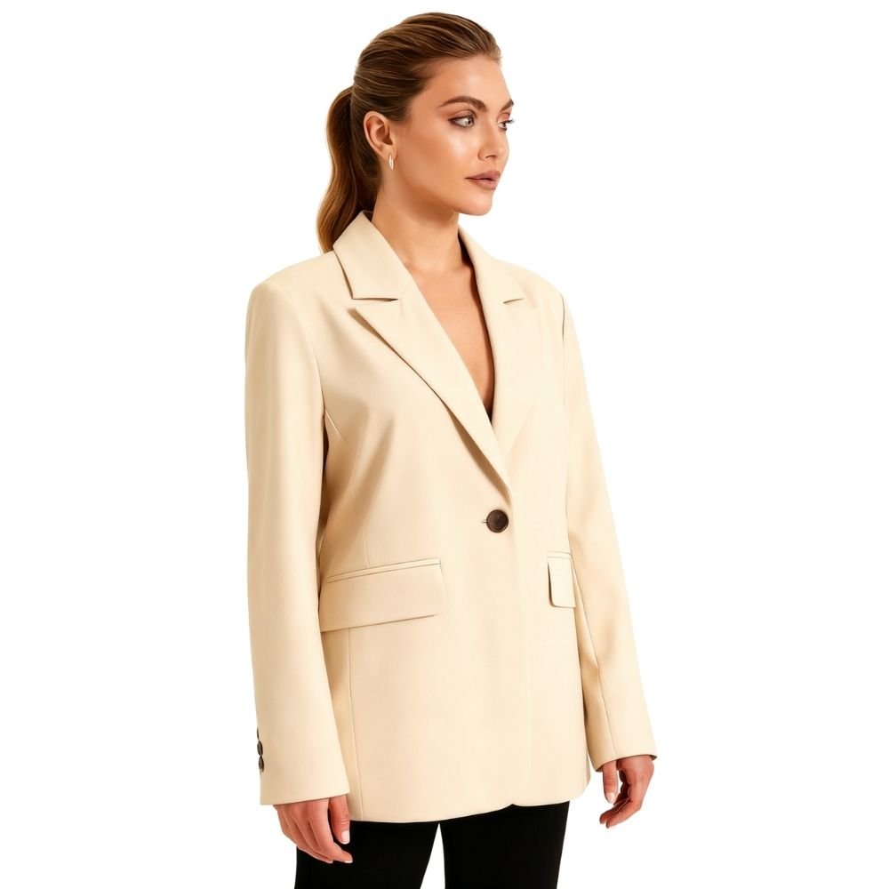 capsule wardrobe essential," "neutral tailored jacket," "investment piece," "business casual attire," "smart casual layering piece," "year-round jacket