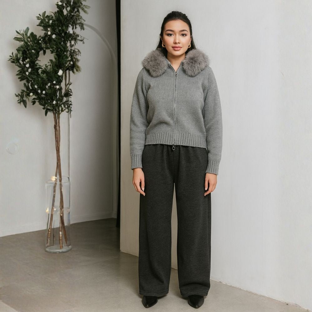 Model wearing Kouvr Fashion gray wool and cashmere blend hooded cardigan with silver fox fur trim