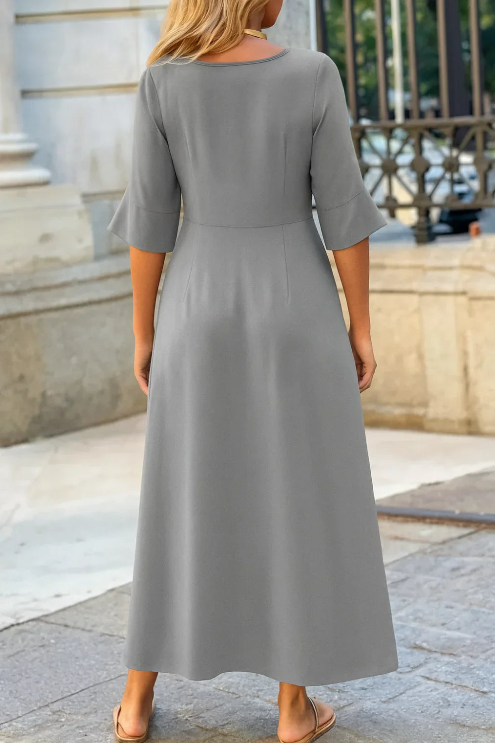 charcoal grey gown," "women's sophisticated travel dress," "minimalist A-line dress," "all-season maxi dress," and "comfortable evening dress