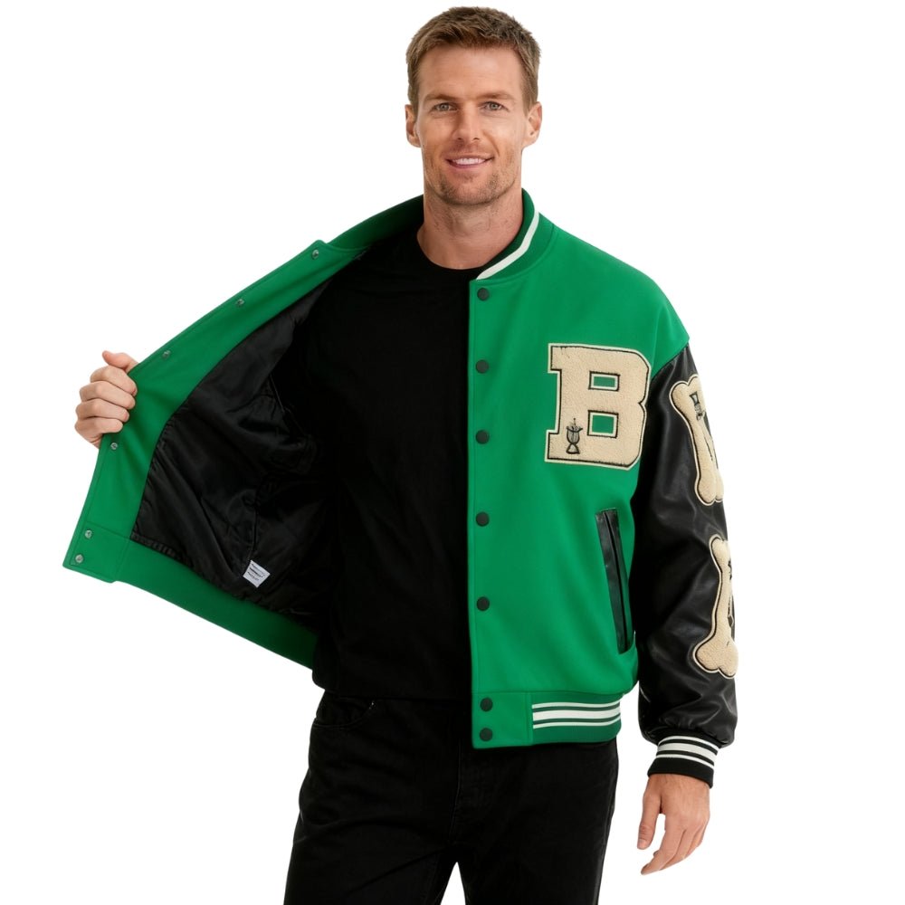 Man wearing a green Kouvr varsity jacket with a letter 'B' on a white background
