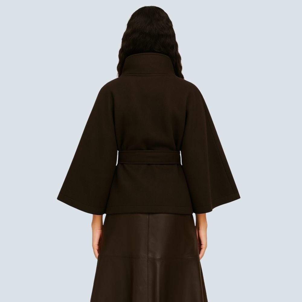 Model wearing the Kouvr Fashion Jannah belted wool cape in espresso brown, featuring a funnel neck and wide waist tie