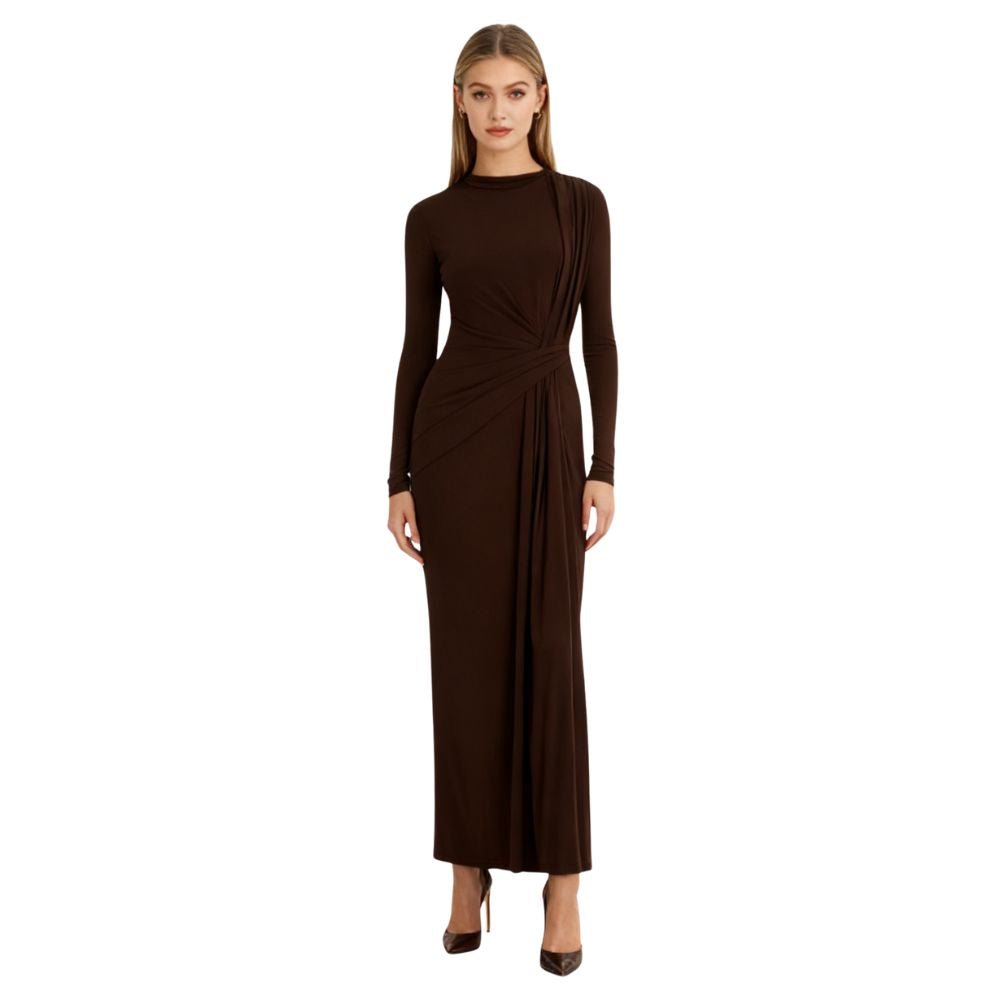 Woman wearing a dark brown kouvr long-sleeve dress on a white background