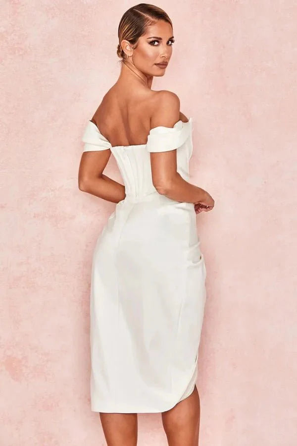 structured bodice, asymmetrical hemline, sweetheart neckline, sculpted silhouette, boning, and figure-flattering