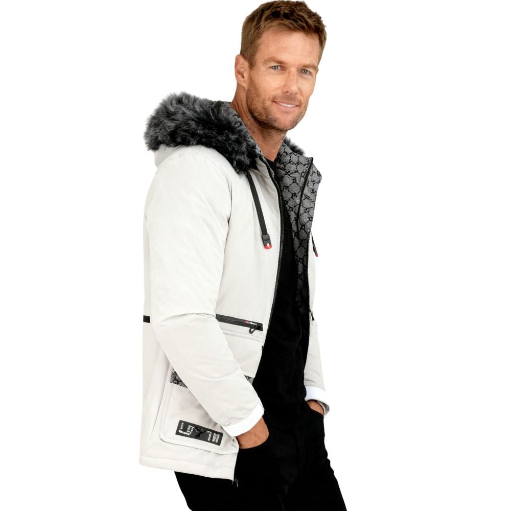 Man wearing a white jacket with a fur-lined hood on a white background