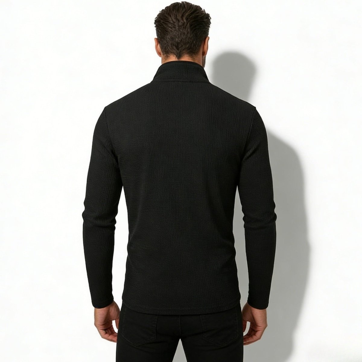 Back view of a male model wearing the black Kouvr Fashion Waffle Knit Pullover, displaying the clean lines and shoulder construction.