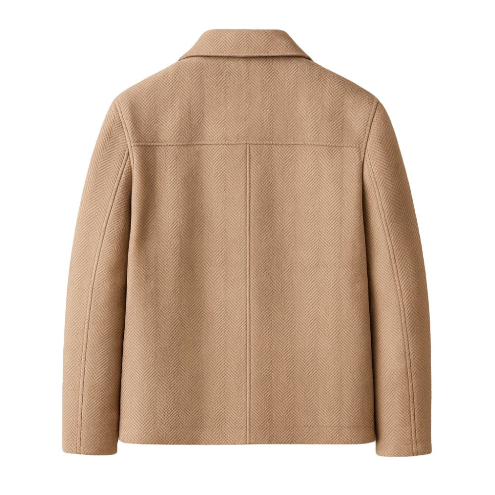 A man wearing the Kouvr Fashion khaki herringbone wool jacket over a white turtleneck, showcasing a smart casual look