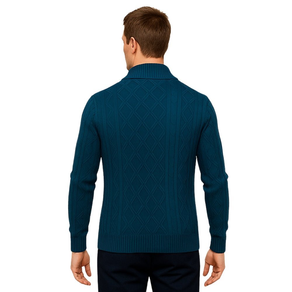 Man wearing a blue kouvr  sweater on a white background