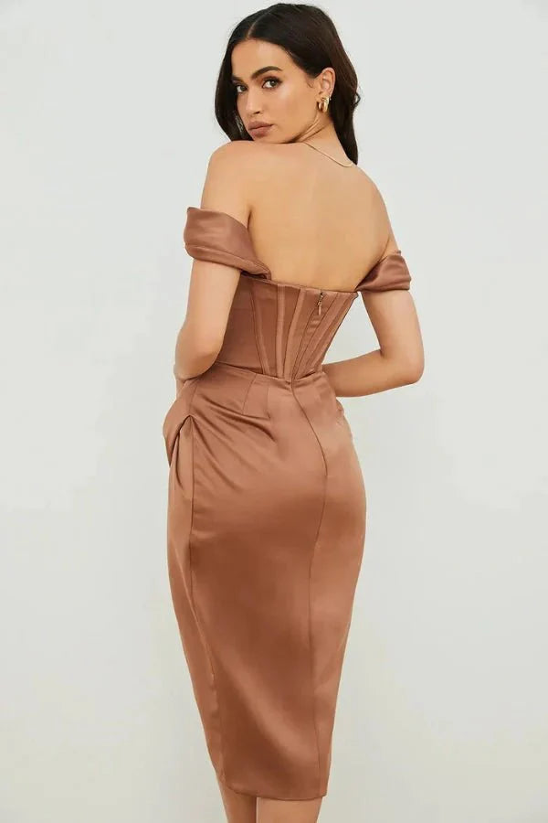 Model wearing Kouvr Fashion mocha brown off-the-shoulder satin corset dress with draped skirt and thigh slit
