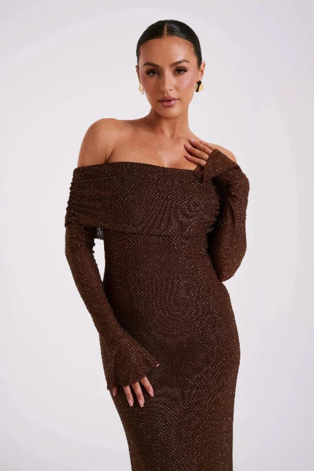 Model wearing Kouvr Fashion long sleeve off-the-shoulder brown sequin formal gown
