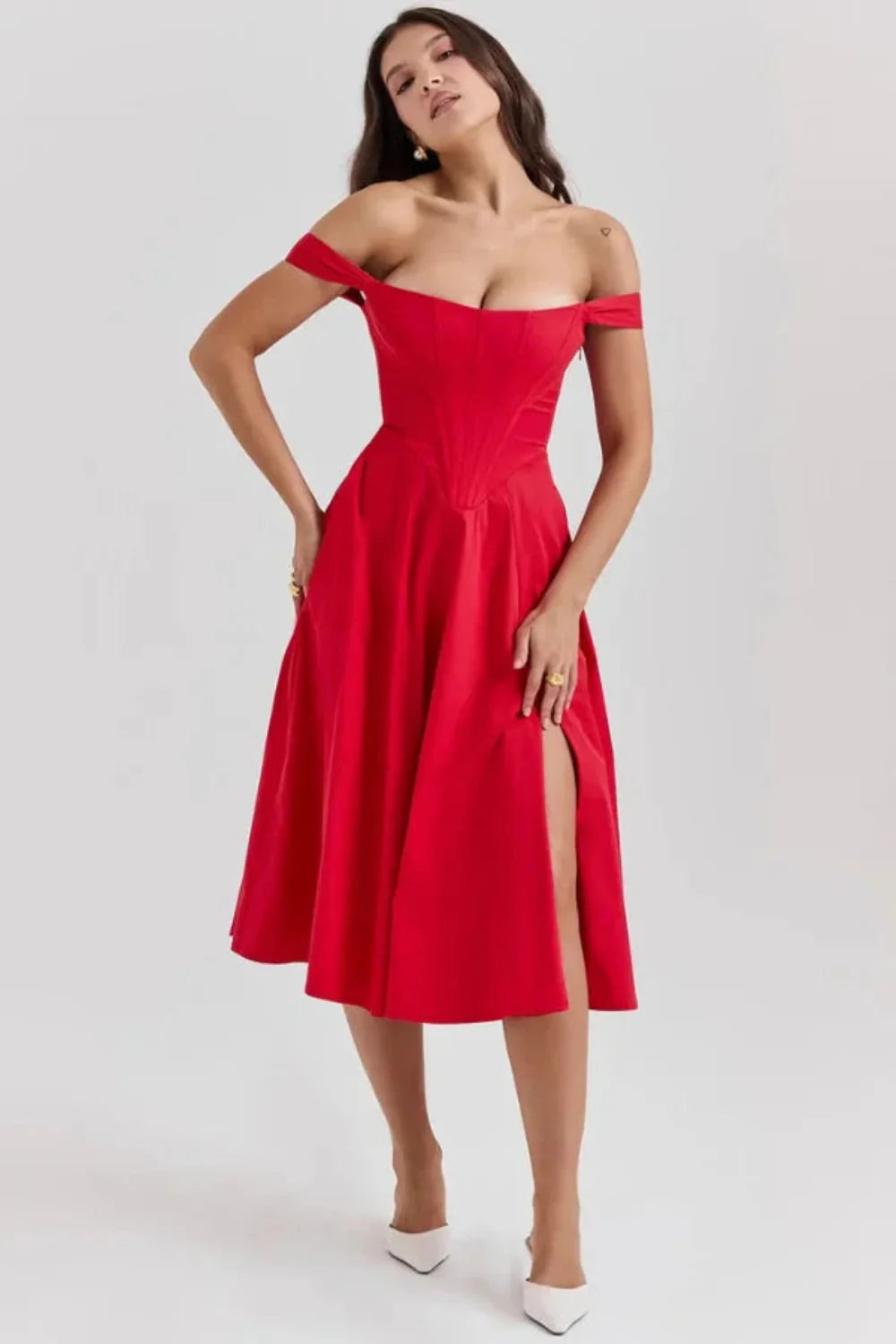 Bardot neckline, bustier dress, A-line skirt, thigh-high slit, lace-up back, wedding guest attire, structured bodice, statement dress