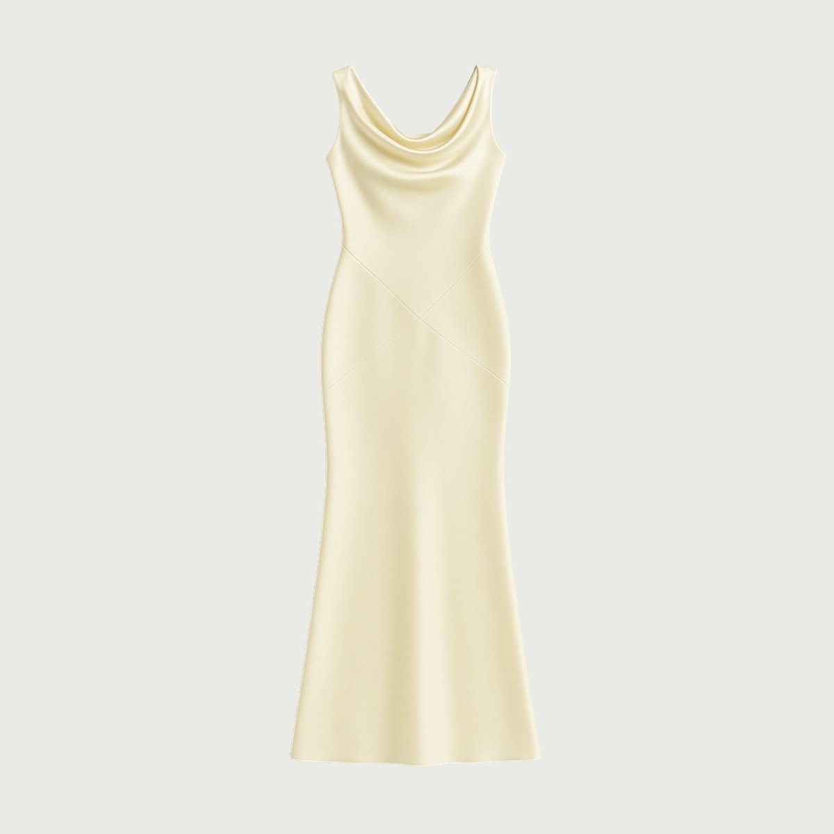 Product flat lay of the Kouvr Fashion Vickie Gown, showing the front cowl neckline and diagonal seam details of the sleeveless buttercream satin dress.