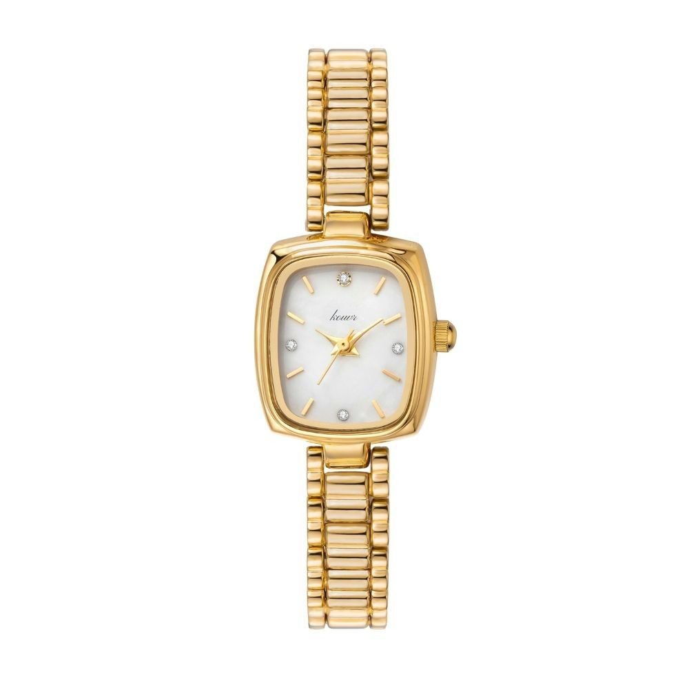Gold Kouvr watch with a white face on a white background