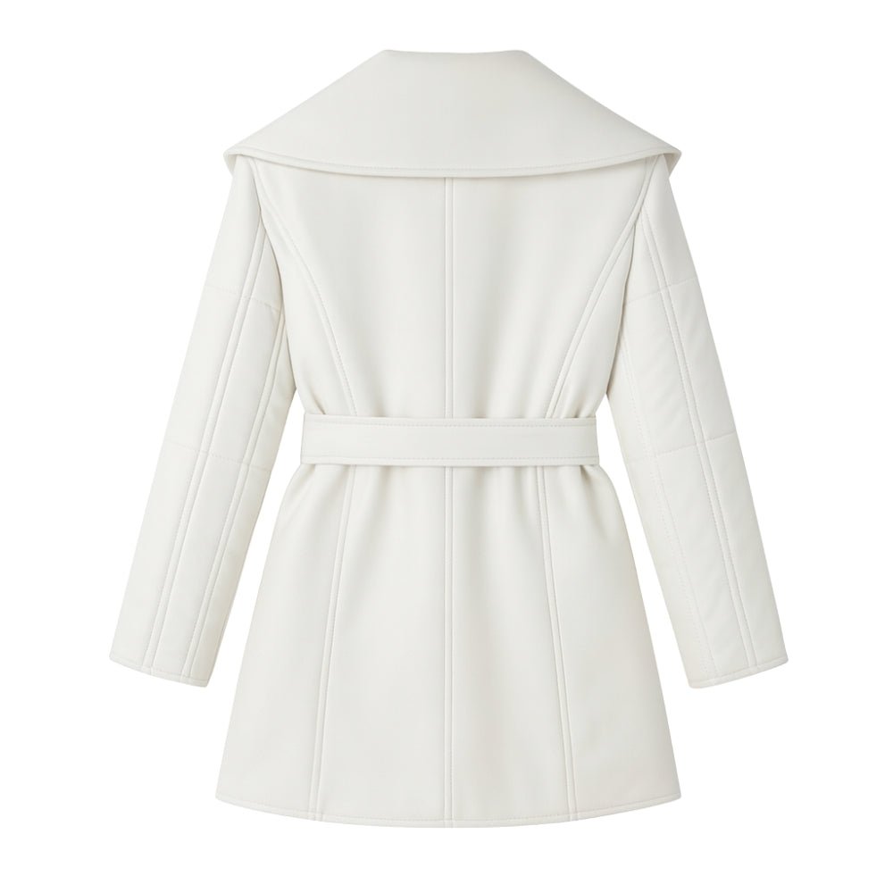 sophisticated outerwear," "statement winter jacket," "minimalist design," "cold weather chic," and "investment piece