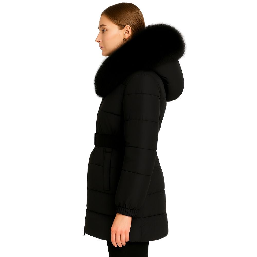 Model wearing the Kouvr Fashion long black belted down puffer coat with a large black fox fur hood