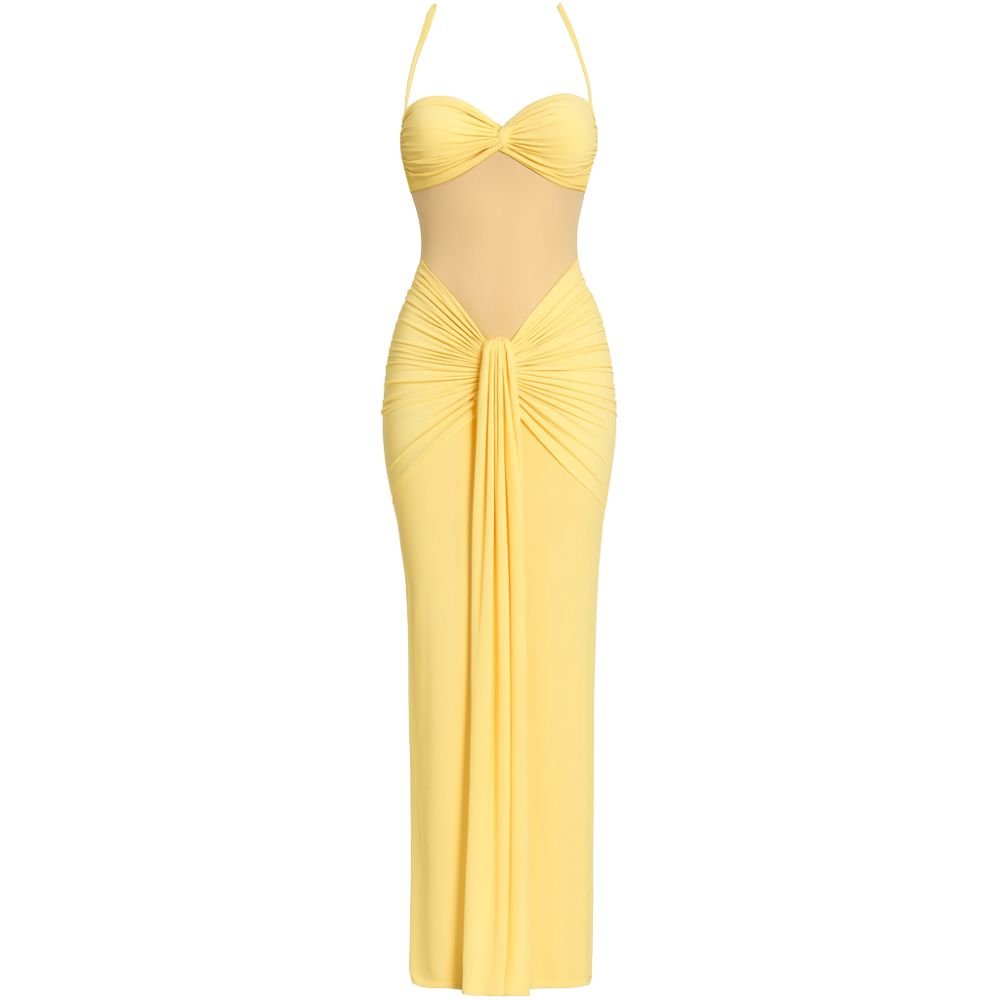 Model wearing the Kouvr Fashion yellow halter neck maxi gown with sheer midriff panel and draped skirt