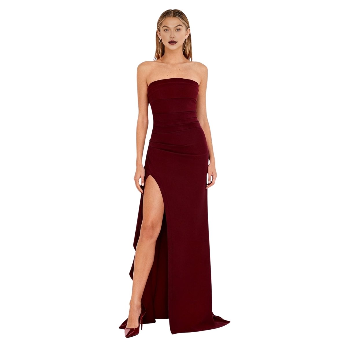 Burgundy kouvr  strapless gown with a high slit on a white background