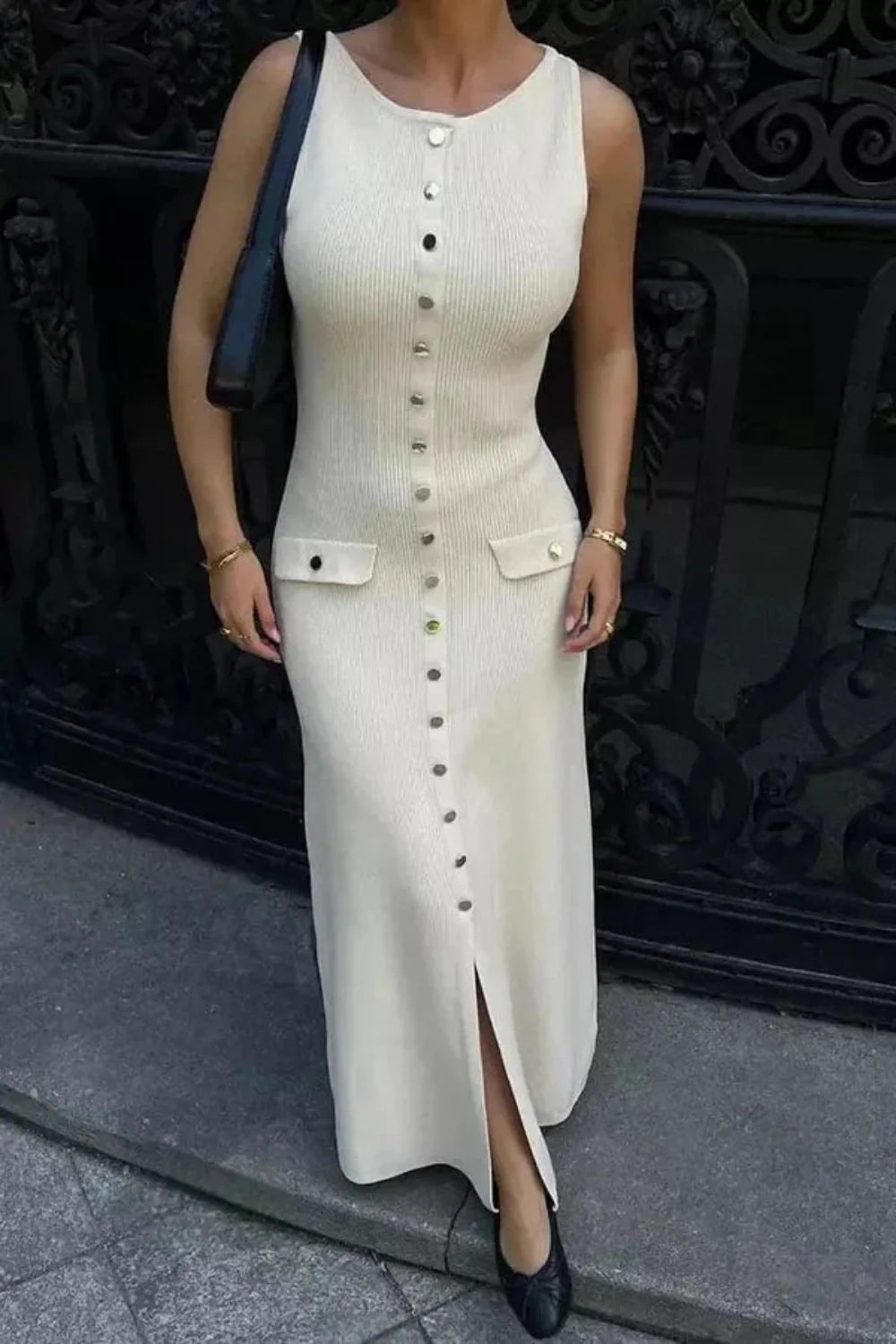 Model wearing the Kouvr Fashion Fiorella white ribbed knit button-front midi dress