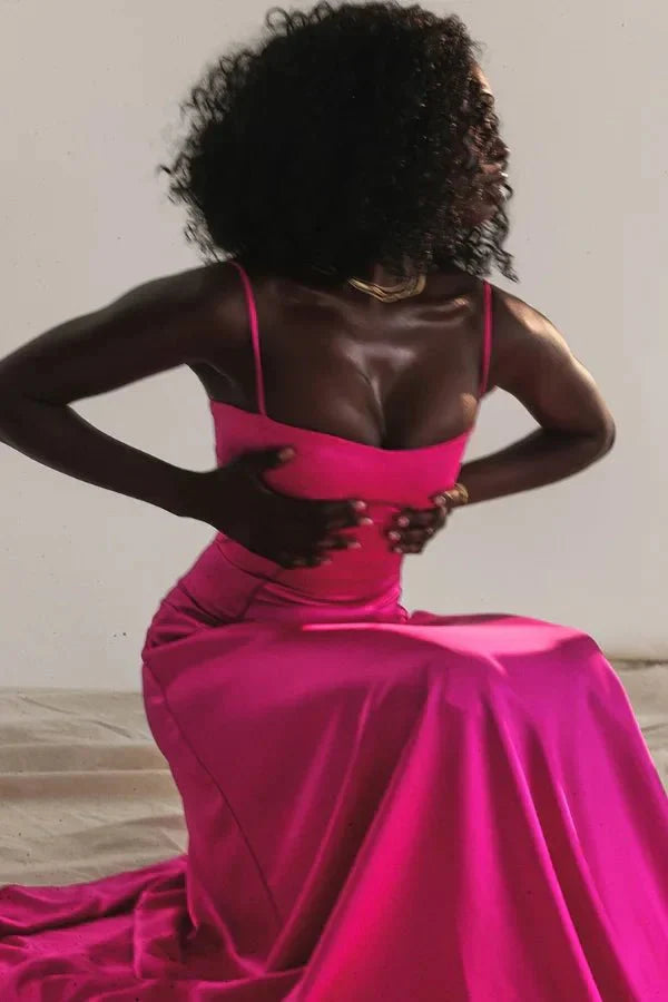 Model wearing the Kouvr Gabriella Gown in Fuchsia Satin with a lace-up corset back.