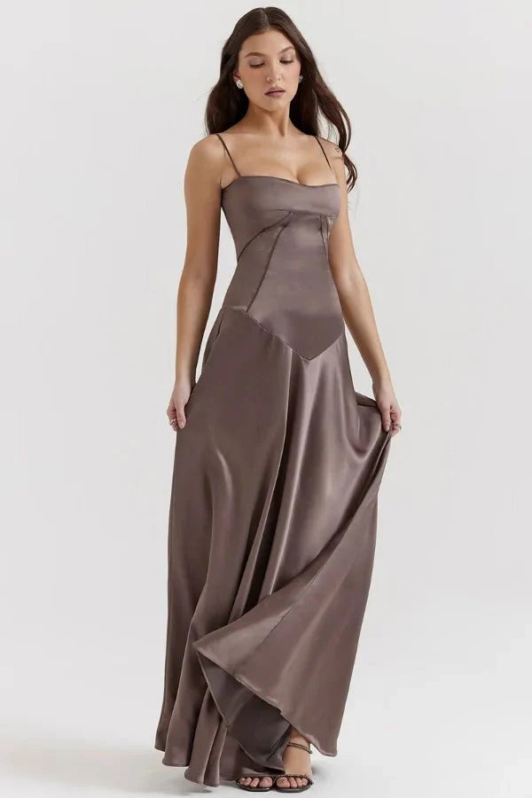 Kouvr Gabriella Gown in Mocha: a brown satin corset maxi dress with a lace-up back, worn by a model.