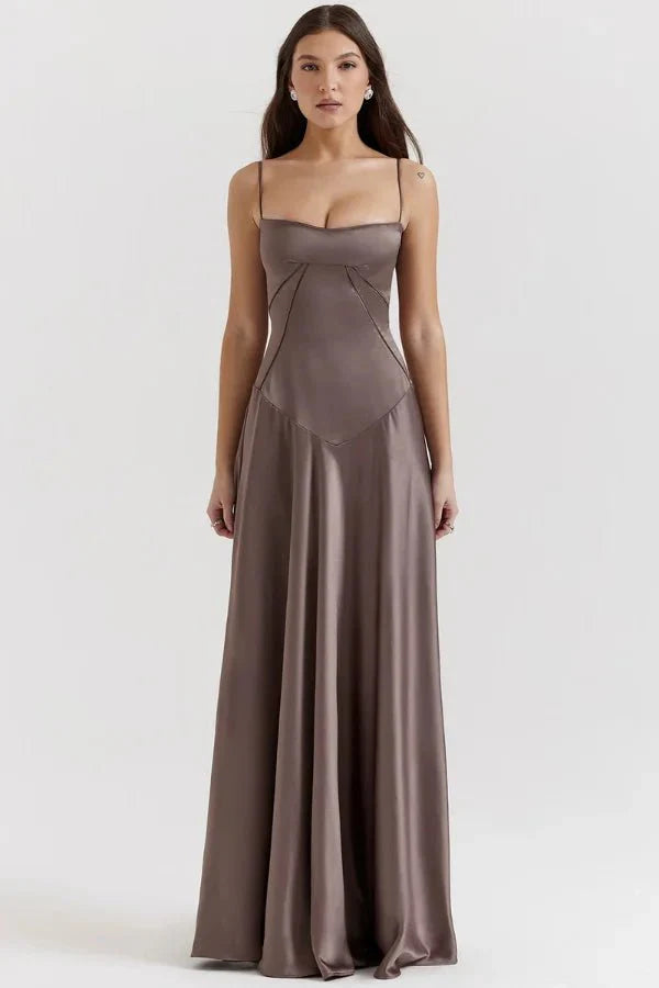 Kouvr Gabriella Gown in Mocha: a brown satin corset maxi dress with a lace-up back, worn by a model.