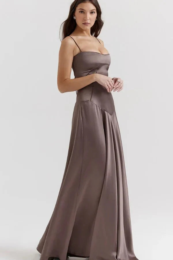 Kouvr Gabriella Gown in Mocha: a brown satin corset maxi dress with a lace-up back, worn by a model.