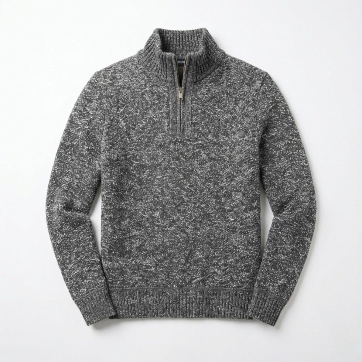 Flat lay studio shot of the Kouvr men's quarter-zip sweater in grey, detailing the marled knit pattern and zip hardware.