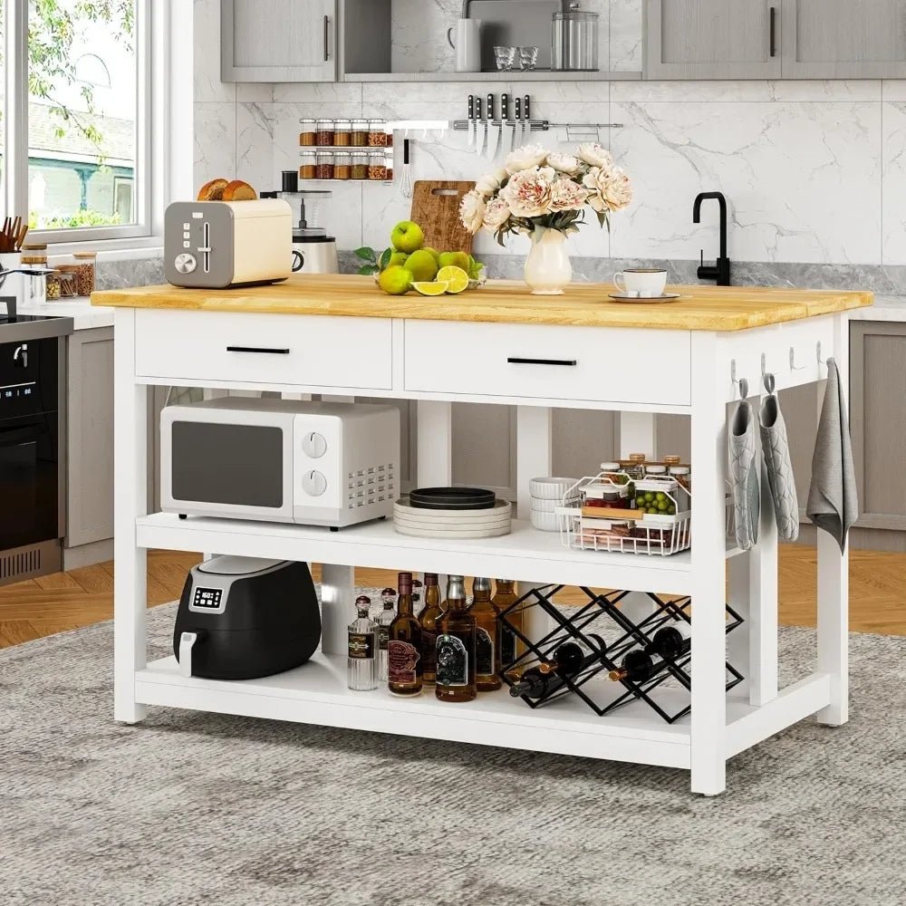 Kitchen island Kouvr with wooden top and white base, featuring appliances and kitchen items.