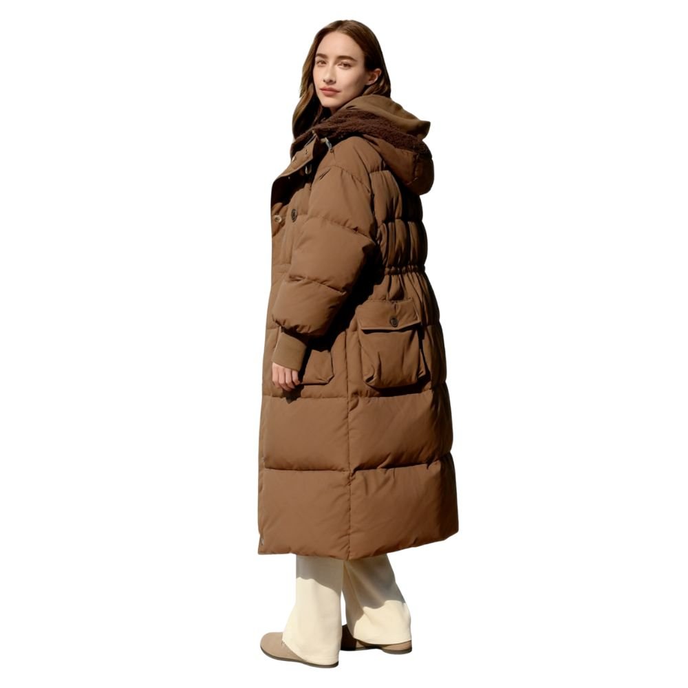 Model wearing the Kouvr Irish long puffer coat in khaki, front view