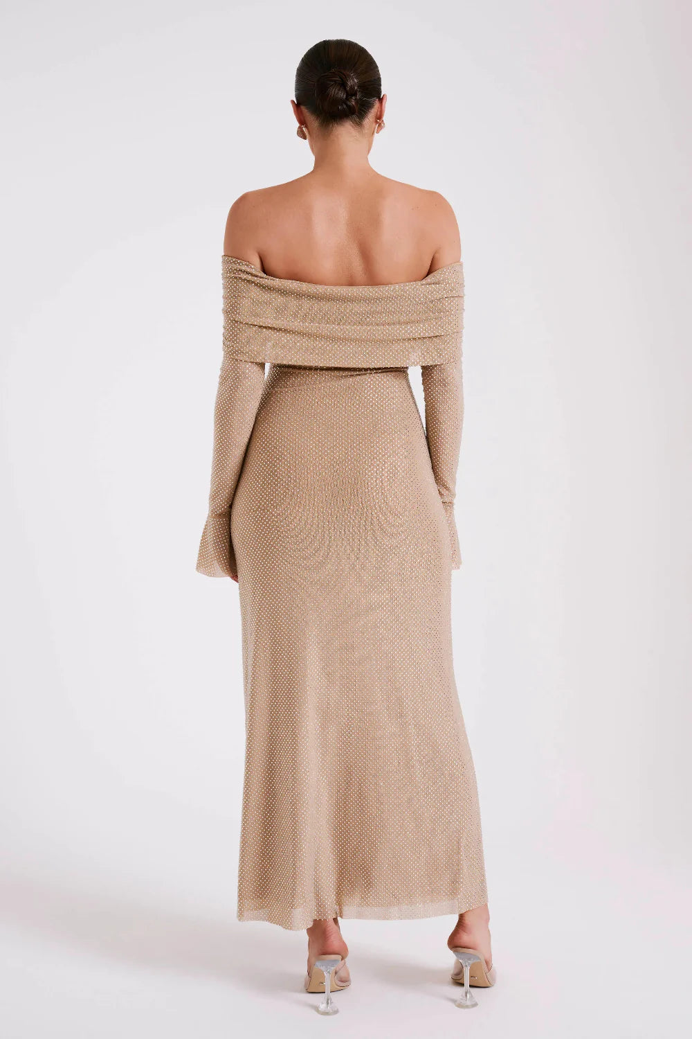 Model from behind in Kouvr Jada Beige off-the-shoulder formal gown with flare sleeves