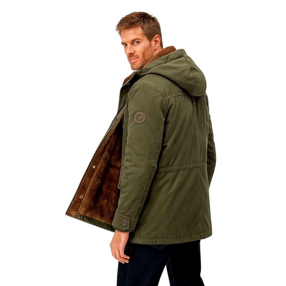 Front view of Kouvr men's green sherpa lined winter parka with hood up