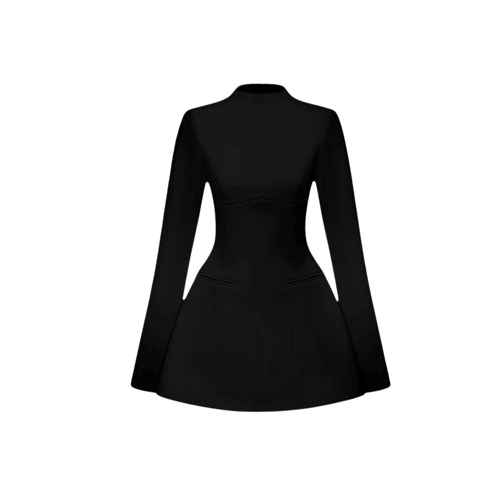Woman wearing Kouvr Kaisha black long sleeve open-back mini dress in a stone archway