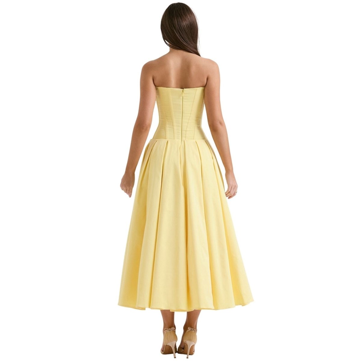 Back view of the Laarni yellow strapless corset midi dress showing the zipper and pleated skirt.