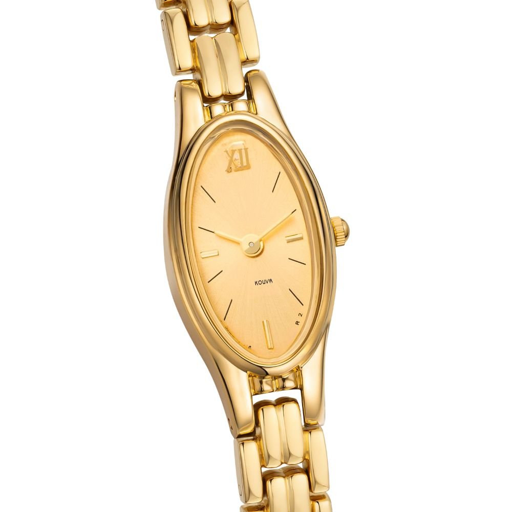 Gold kouvr watch with a white background