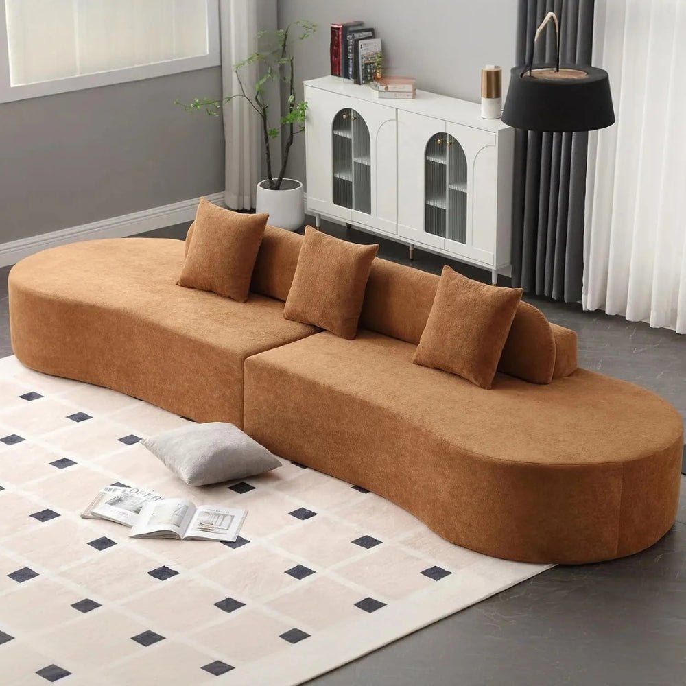luxe couch," "minimalist sofa," "low-profile sectional," "bouclé fabric sofa," "cloud sofa alternative," and "statement living room furniture
