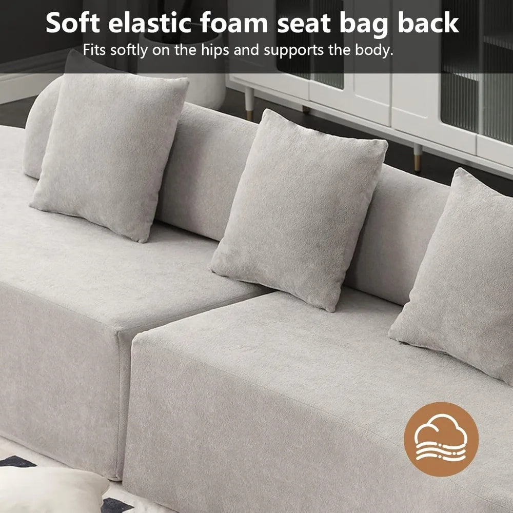 luxe couch," "minimalist sofa," "low-profile sectional," "bouclé fabric sofa," "cloud sofa alternative," and "statement living room furniture