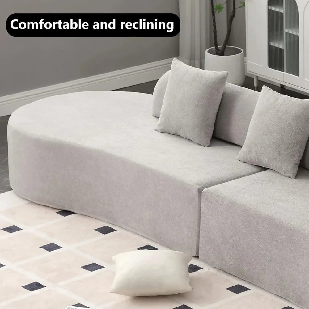 luxe couch," "minimalist sofa," "low-profile sectional," "bouclé fabric sofa," "cloud sofa alternative," and "statement living room furniture