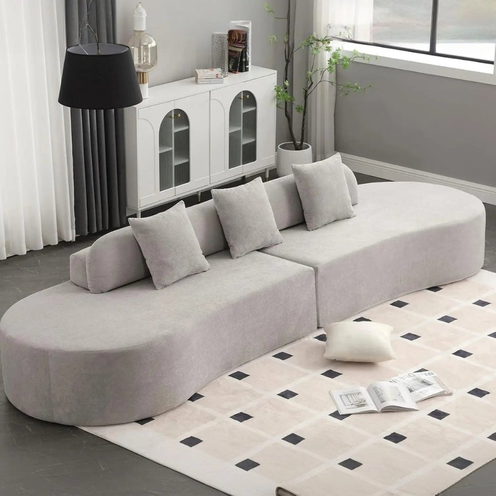 luxe couch," "minimalist sofa," "low-profile sectional," "bouclé fabric sofa," "cloud sofa alternative," and "statement living room furniture
