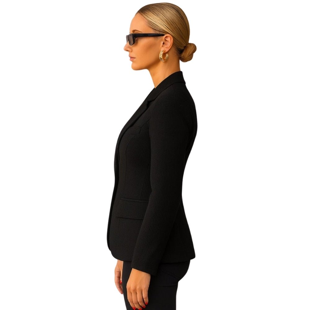 Model wearing the Kouvr Maureen Textured Weave Blazer in black,