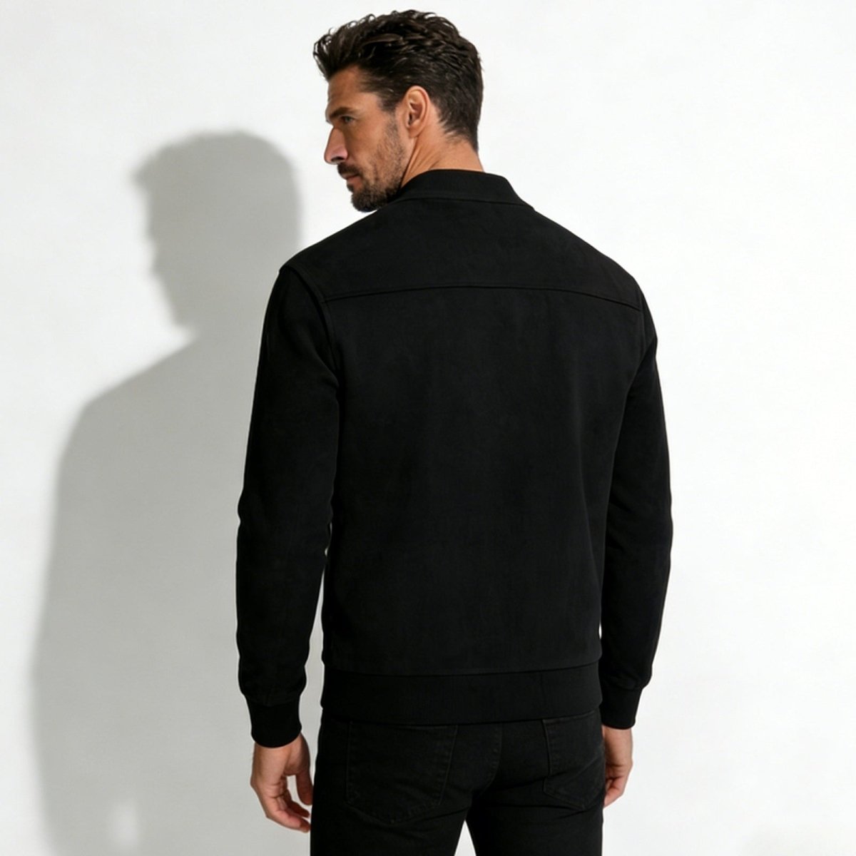 Back view of the Kouvr men's luxury suede bomber jacket, highlighting the shoulder yoke detail.
