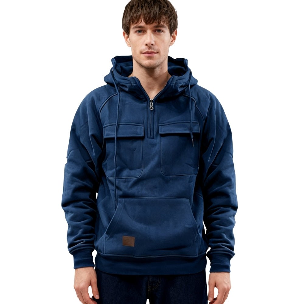 Men's slate blue Dominic utility hoodie by Kouvr, front view showing half-zip and chest pockets.