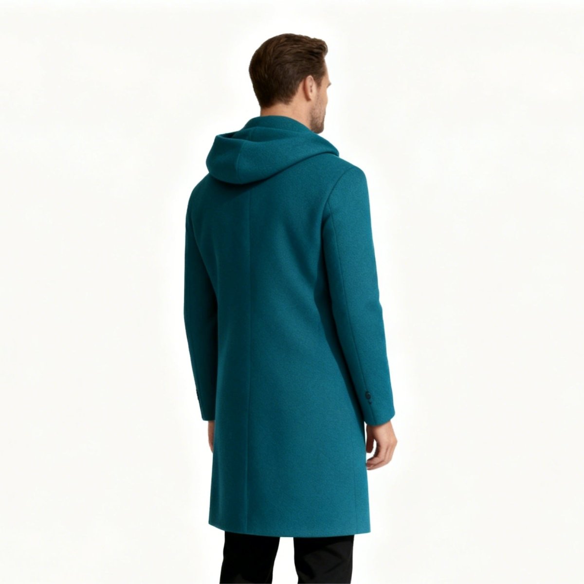 Back profile view of a man in the Kouvr Blue Hooded Overcoat, highlighting the slim fit and deep welt pocket.