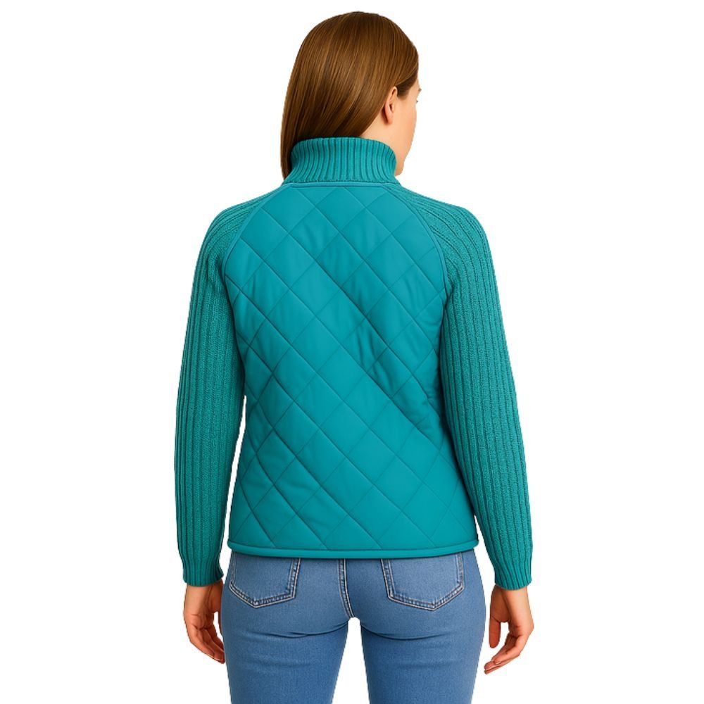 Model wearing the Kouvr Arlington Quilted Hybrid Jacket with blue jeans