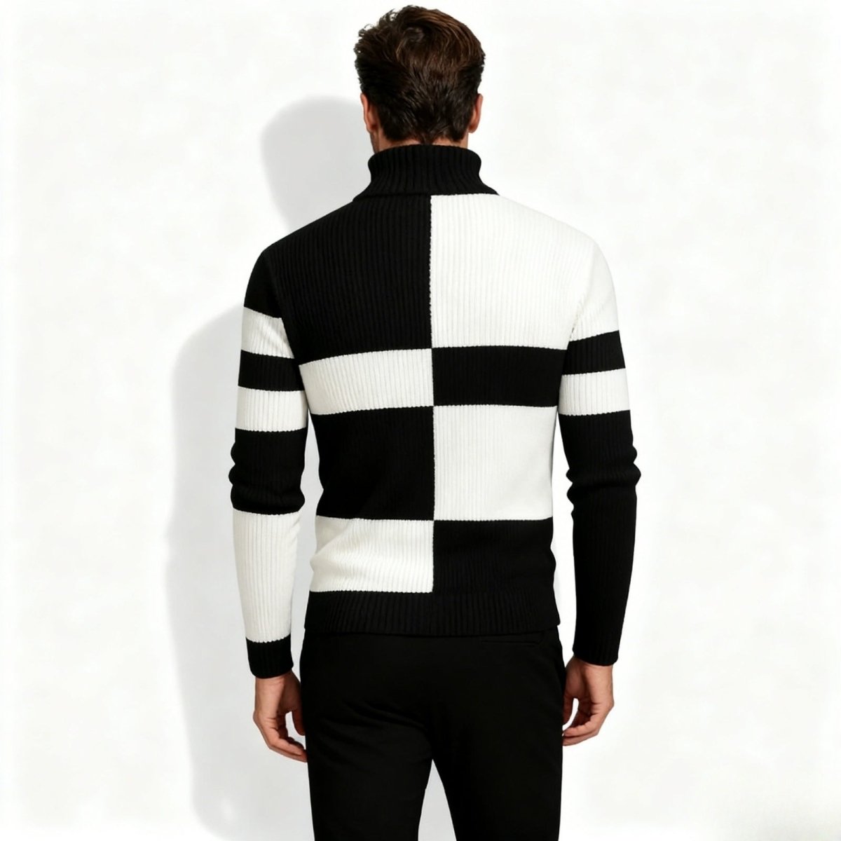 Back view of the Kouvr Nerthus men's sweater, displaying the full black and white checkered and striped graphic pattern. 