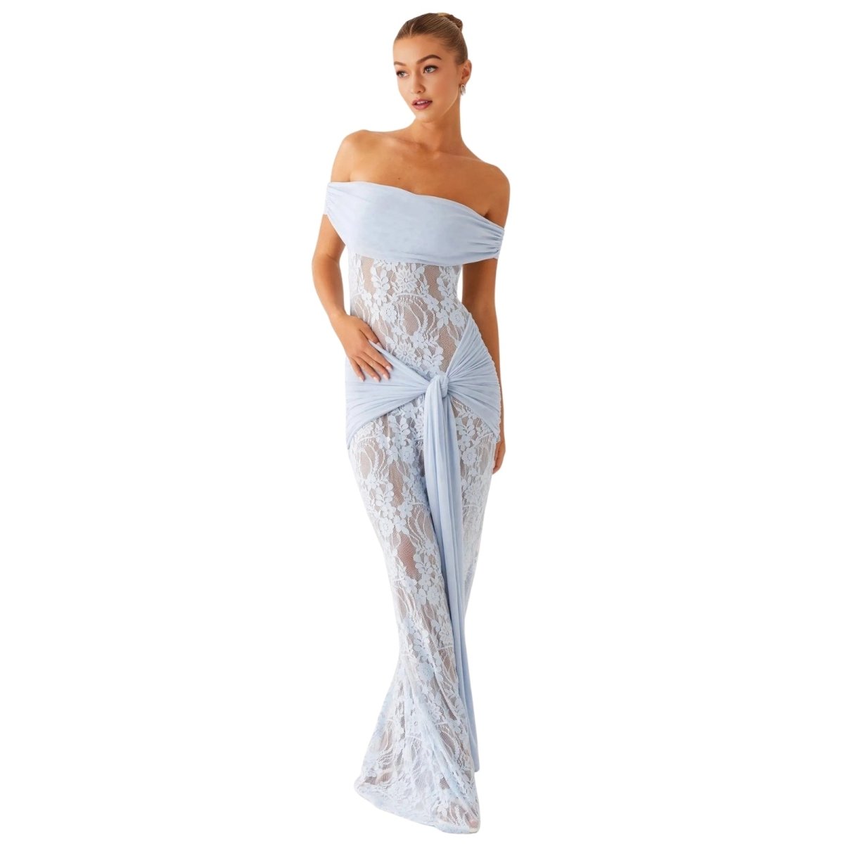 Woman wearing a light blue Kouvr off-shoulder lace gown on a white background