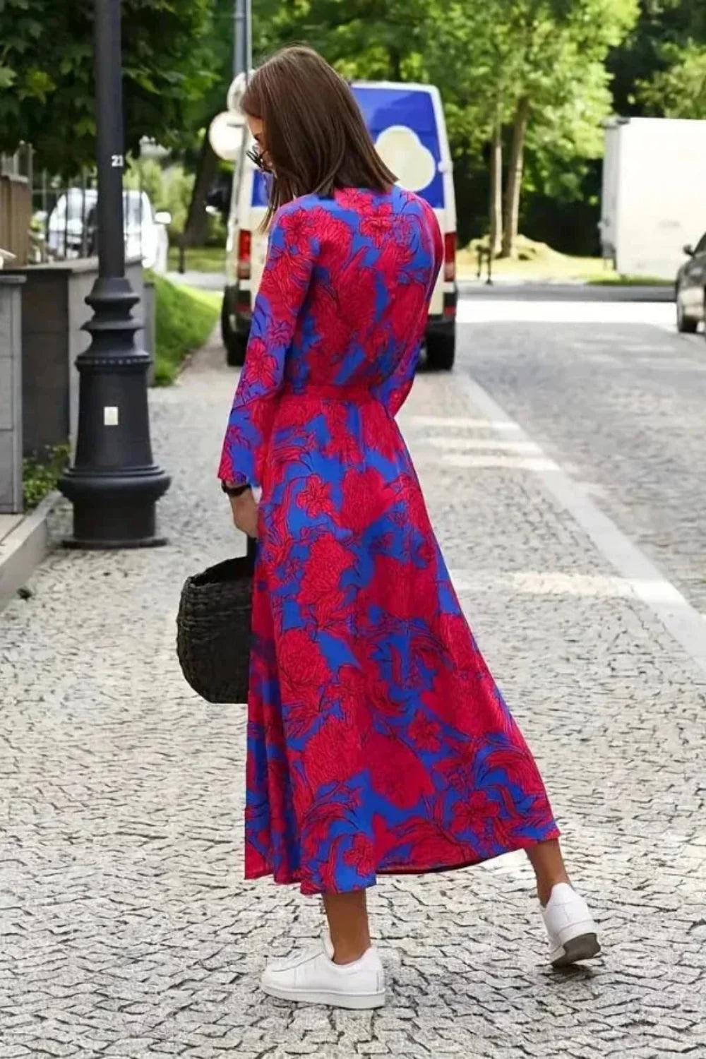 Back view of the Aleia floral silk wrap dress.