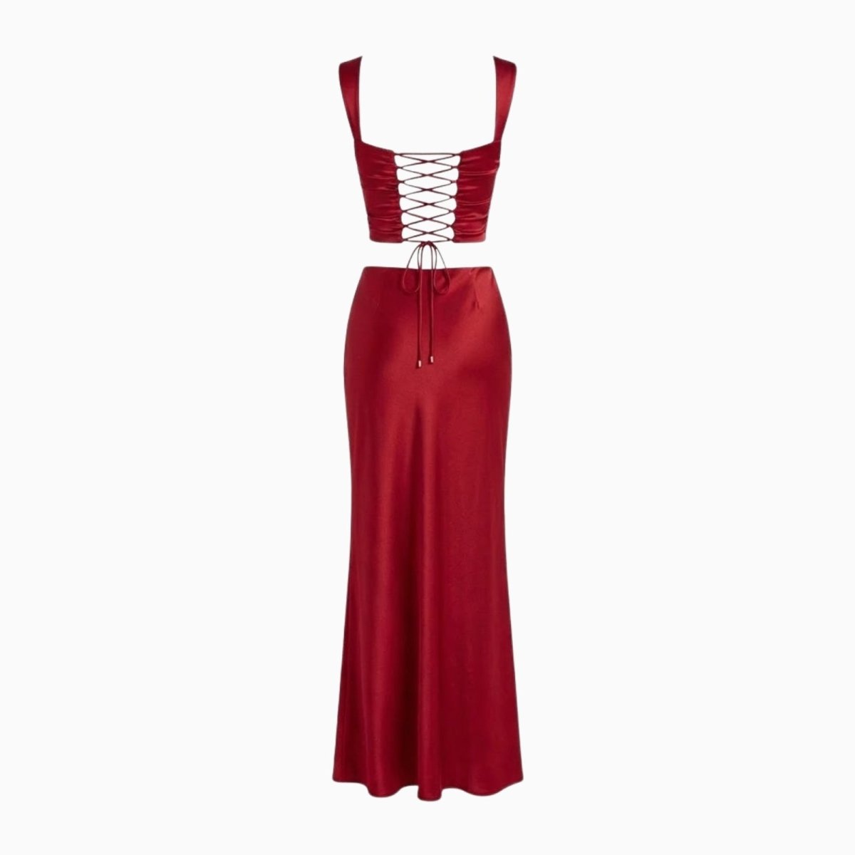 Flat lay of the Kouvr Rona set in red satin, showing the back of the top with its corset lacing and the full length of the skirt.