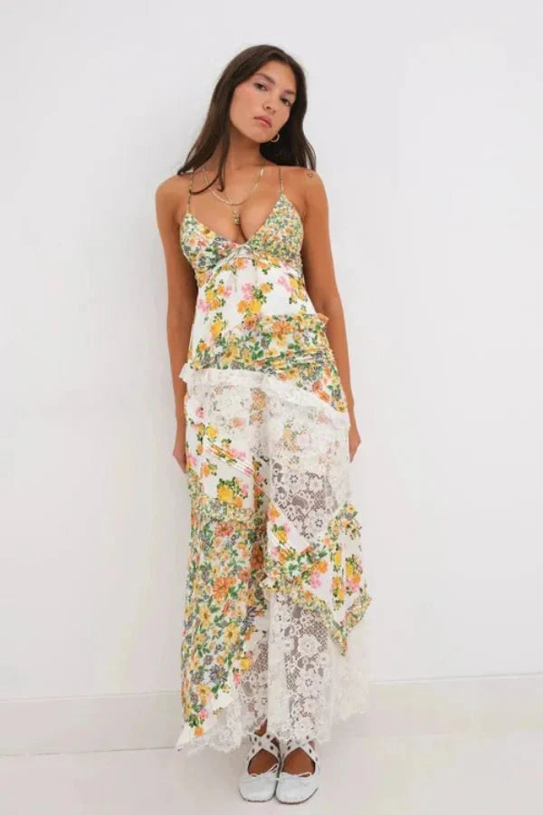 Model wearing Kouvr Fashion floral and lace maxi dress with open back