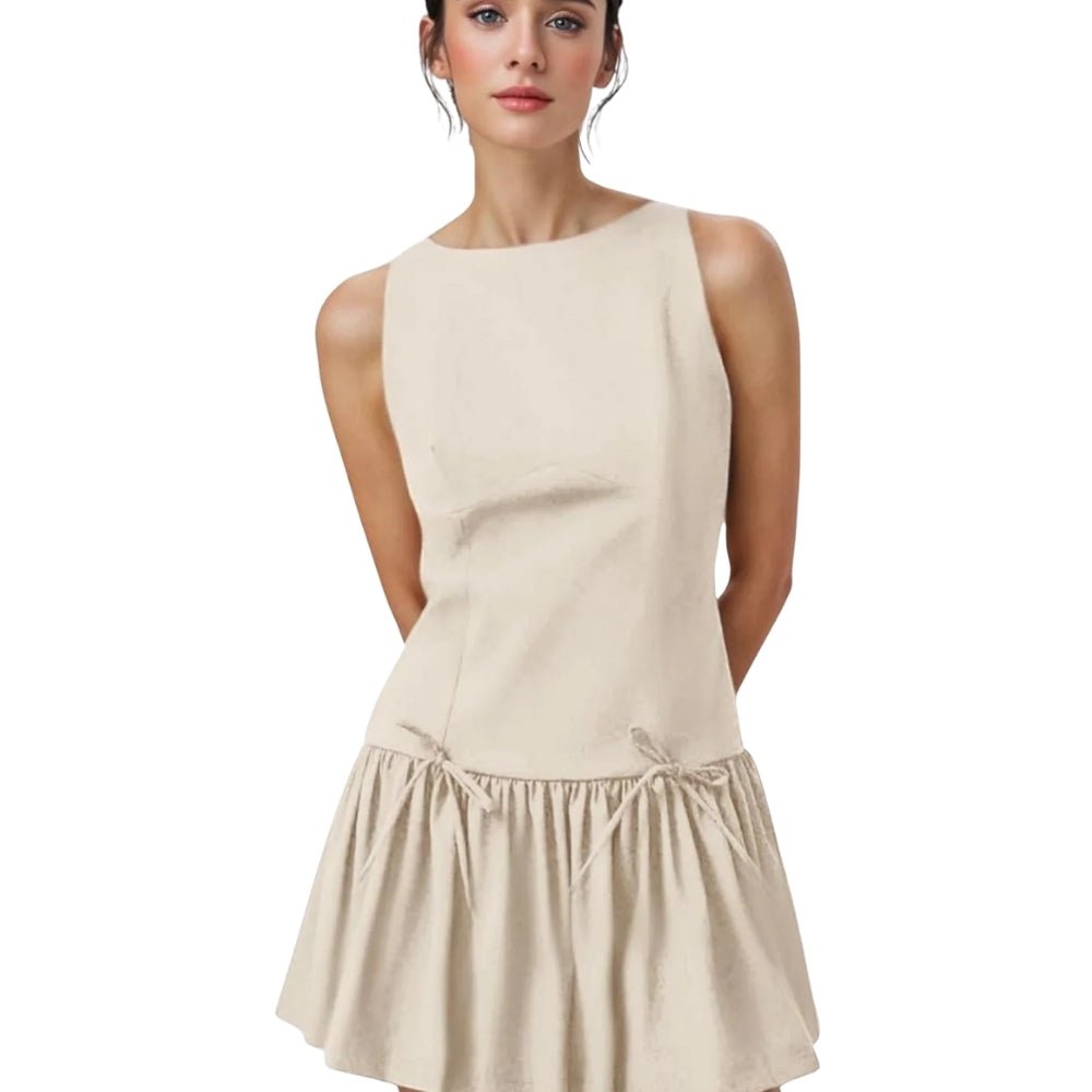 Woman wearing a Ivory Kouvr  sleeveless dress on a white background